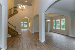 Interior of House Remodeling Companies in North Houston, beautiful arches and brown flooring