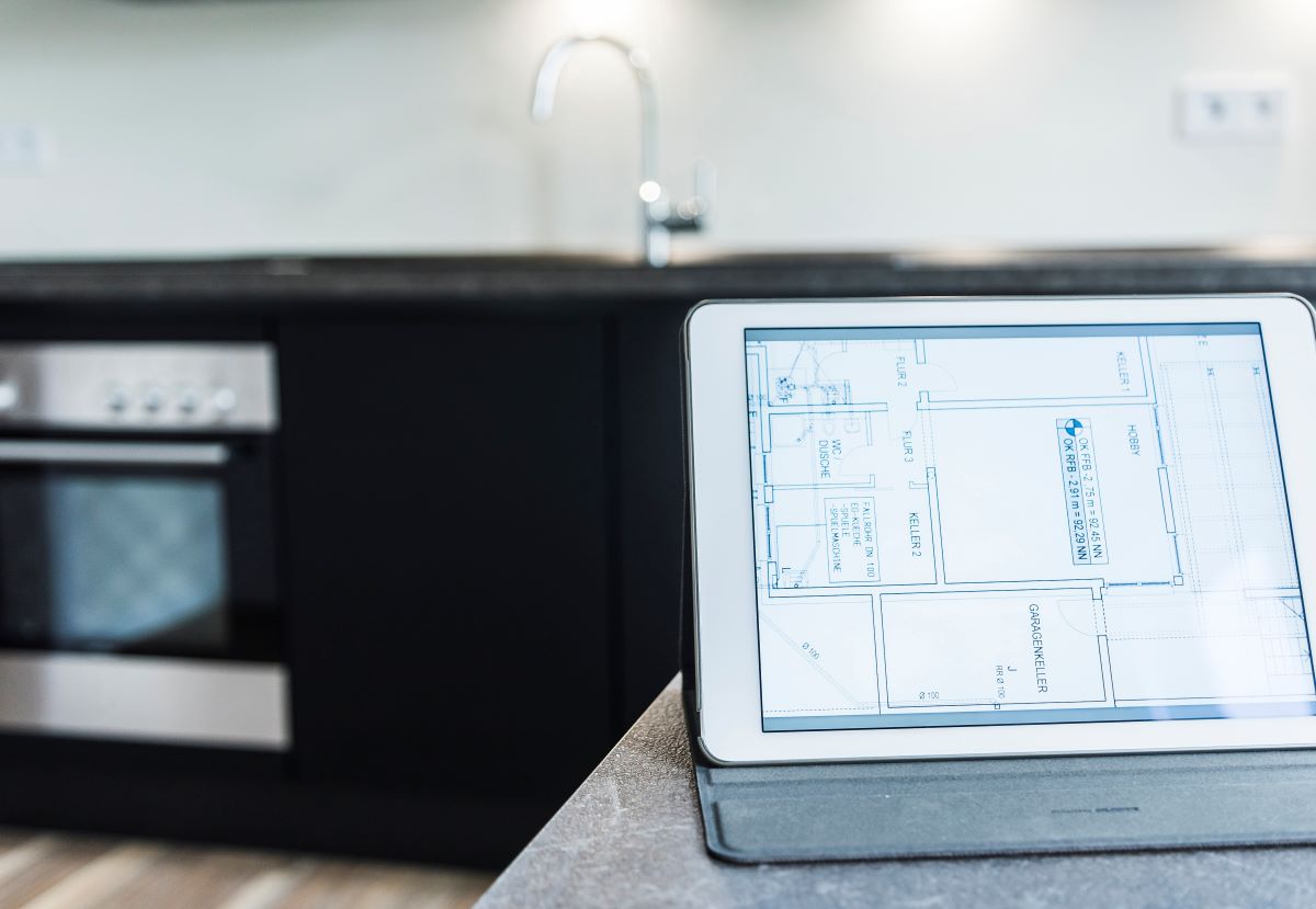 tablet-with-floor-plan-on-kitchen-counter